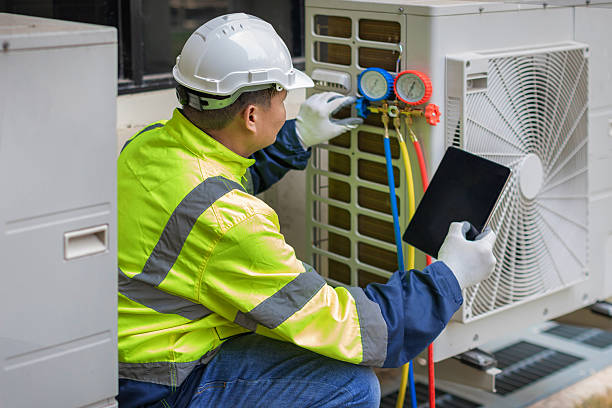 Professional Heat Pump Repair technician working in Springfield, IL